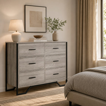 Commode industriel Oslo grise à 6 tiroirs dans une chambre moderne aux tons naturels et chaleureux