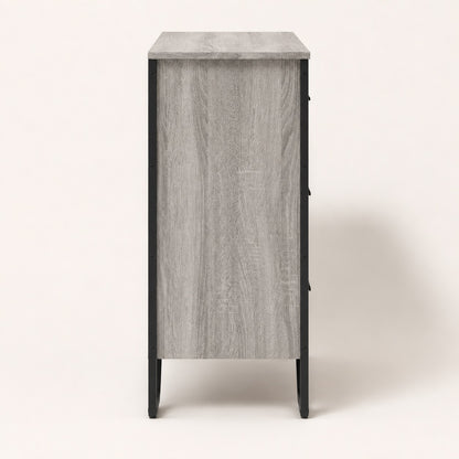 Vue de côté de la commode industriel Oslo grise avec panneaux effet bois et piètement en métal noir