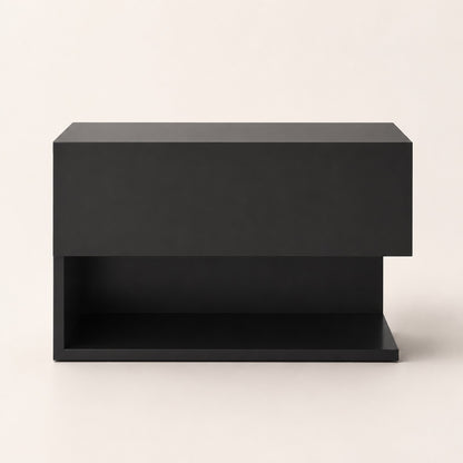 Vue de face d'une table de chevet suspendues moderne noire avec tiroir et niche ouverte.