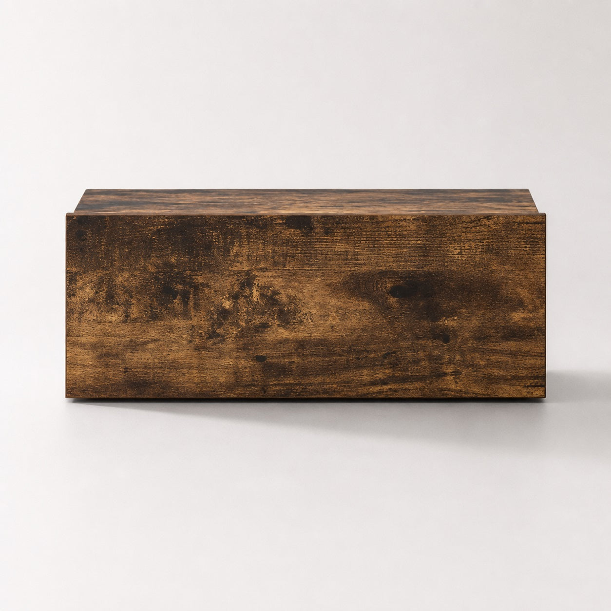 Vue de face d'une table de chevet suspendue en bois finition chêne fumé au style minimaliste.