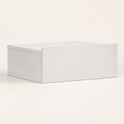Table de chevet suspendue blanche avec tiroir au design minimaliste, idéale pour une chambre contemporaine.