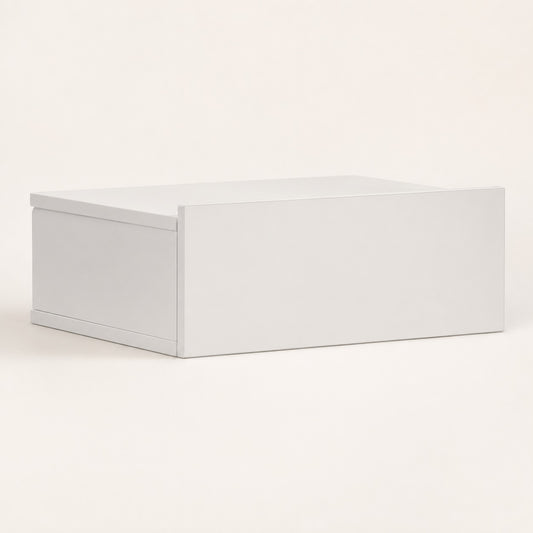 Table de chevet suspendue blanche avec tiroir au design minimaliste, idéale pour une chambre contemporaine.
