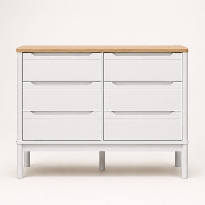 Vue de face de la commode blanche 6 tiroirs avec plateau effet bois et lignes épurées