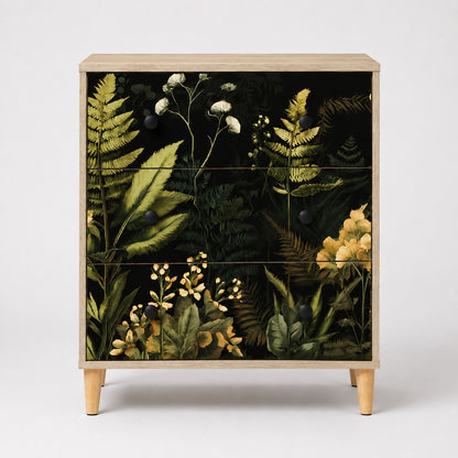 Commode 3 tiroirs Celia vue de face, commode design en bois clair avec élégantes façades végétales noires.