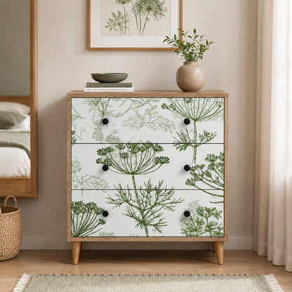 Commode 3 tiroirs Dalia vue de face, avec façades florales et structure en bois clair.