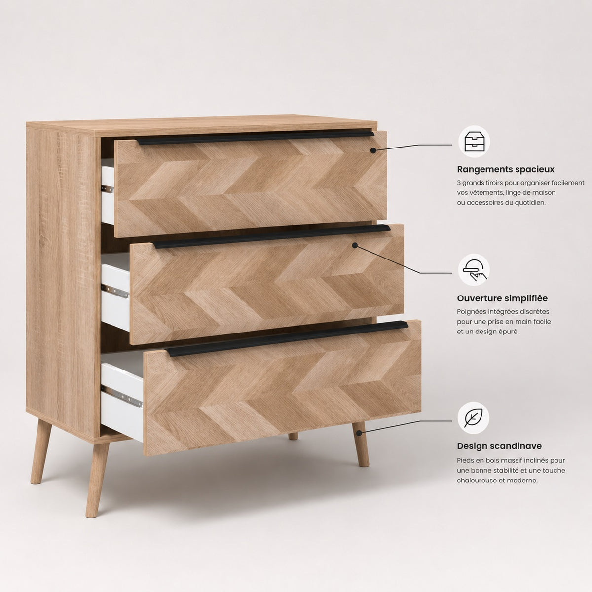 Commode 3 tiroirs design ouverte avec rangements spacieux, poignées noires et pieds inclinés.
