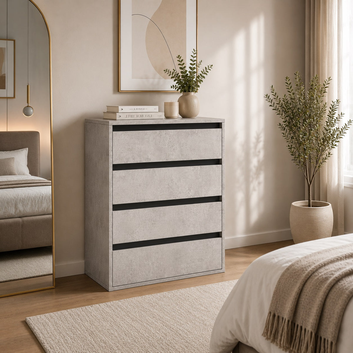 Commode 4 tiroirs finition béton intégrée dans une chambre élégante au style contemporain et chaleureux.