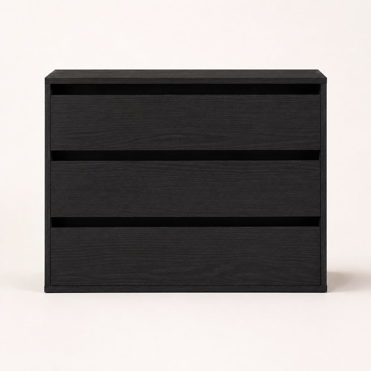 Commode noire 3 tiroirs au design minimaliste avec façade épurée pour chambre contemporaine.