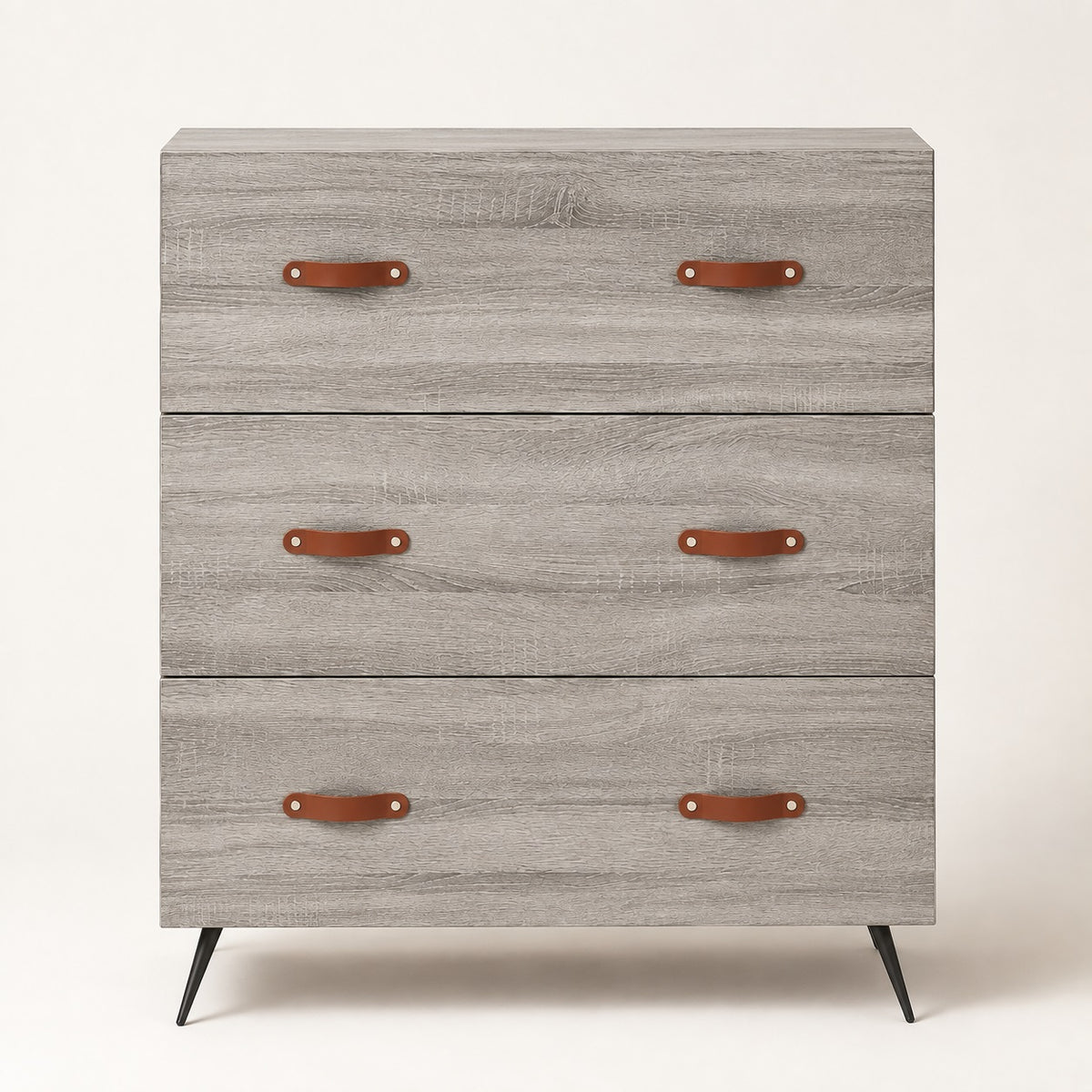 Commode grise 3 tiroirs Sylva dans une chambre lumineuse et élégante au style naturel et contemporain.
