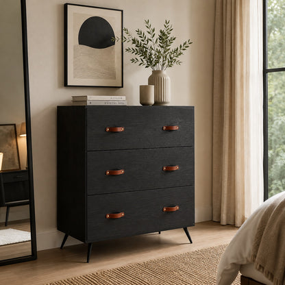 Commode noire 6 tiroirs dans une chambre élégante, avec poignées effet cuir et finition bois contemporaine.