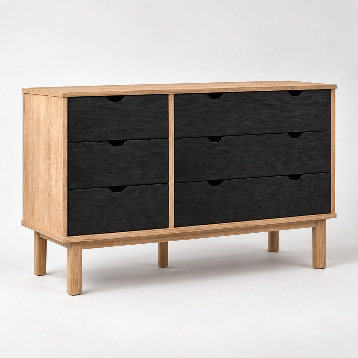 Commode en bois avec façades noires, design scandinave moderne à 6 tiroirs pour chambre élégante.